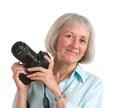 Smiling Senior Woman With Camera Royalty Free Stock Photo