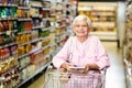 Smiling senior woman with grocery list Royalty Free Stock Photo