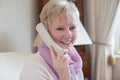 Smiling Senior Woman Making Phone Call At Home Royalty Free Stock Photo