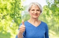 Smiling senior woman r showing thumbs up Royalty Free Stock Photo