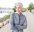 Smiling Senior Woman Relax Listening Music With Earphones After Running Royalty Free Stock Photo