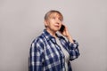 Smiling senior woman talking on mobile phone Royalty Free Stock Photo