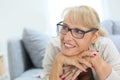 Smiling senior woman wearing eyeglasses Royalty Free Stock Photo