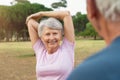 Senior woman stretching arms Royalty Free Stock Photo