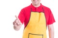 Smiling shopman pressing on empty screen Royalty Free Stock Photo