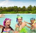 Smiling siblings swimming