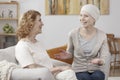 Smiling sick woman enjoying meeting