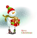 Smiling snowman with Christmas gift Royalty Free Stock Photo