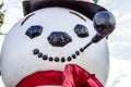 Large Smiling Snowman With Black Pipe And Scarf Royalty Free Stock Photo