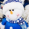 Snowman toy dressed in scarf and cap Royalty Free Stock Photo