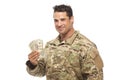 Smiling soldier holding money