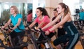 Elderly and young women working out hard in sport club Royalty Free Stock Photo