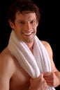 Smiling sportsman with towel Royalty Free Stock Photo