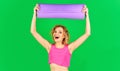 Smiling sportswoman with yoga mat. Happy Sporty girl in sportswear. Healthy lifestyle. Fit woman. Royalty Free Stock Photo