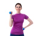 Smiling sporty woman in violet T-short over white isolated background Royalty Free Stock Photo