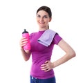 Smiling sporty woman in violet T-short over white isolated background Royalty Free Stock Photo