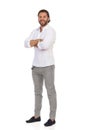 Smiling Standing Man With Arms Crossed. Front Side View Royalty Free Stock Photo