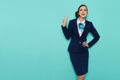 Smiling Stewardess Is Showing Peace Hand Sign Royalty Free Stock Photo