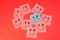 Smiling sticky notes and one s?d sticky note. Royalty Free Stock Photo