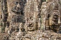 Smiling stone faces of the Bayon temple in Angkor Thom in Cambodia Royalty Free Stock Photo