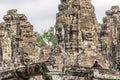 Smiling stone faces of the Bayon temple in Angkor Thom in Cambodia Royalty Free Stock Photo