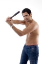 Smiling strong man with wooden bat