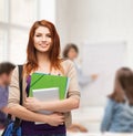 Smiling student with bag, folders and tablet pc Royalty Free Stock Photo