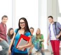 Smiling student with bag, folders and tablet pc Royalty Free Stock Photo