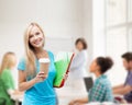 Smiling student with folders Royalty Free Stock Photo