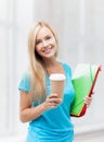 Smiling student with folders Royalty Free Stock Photo