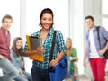 Smiling student with folders, tablet pc and bag Royalty Free Stock Photo