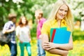 Smiling student girl outdoors Royalty Free Stock Photo