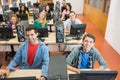 Smiling students in the college computer room Royalty Free Stock Photo