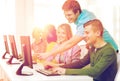 Smiling students in computer class at school Royalty Free Stock Photo