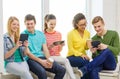 Smiling students with tablet pc computer