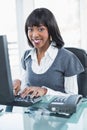 Smiling stylish businesswoman working on computer Royalty Free Stock Photo