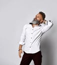 Stylish bearded hipster man scratching back of his head Royalty Free Stock Photo