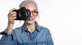 Senior woman with digital camera Royalty Free Stock Photo