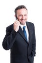 Smiling and successful business man talking on the phone Royalty Free Stock Photo