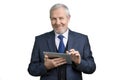 Smiling successful businessman with tablet. Royalty Free Stock Photo