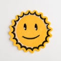 Smiling sun embroidered felt patch Royalty Free Stock Photo