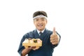Smiling sushi chef with thumbs up Royalty Free Stock Photo