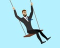 Smiling swinging man in suit. Happy successful businessman relaxing and playing on swing. Male business success and