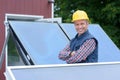 Smiling technician solar panels Royalty Free Stock Photo