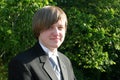 Smiling Teen Boy In Black Tuxedo Horizontal