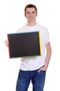 Smiling teen boy with chalkboard Royalty Free Stock Photo