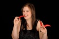 Smiling teen eating peppers Royalty Free Stock Photo