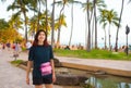 Smiling teen female tourist at Kuhio beach, Honolulu, Hawaii Royalty Free Stock Photo