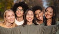 Smiling teen friends taking selfie while walking in park Royalty Free Stock Photo