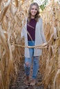 Smiling teen girl in cornfield Royalty Free Stock Photo